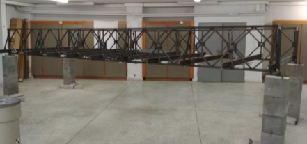 Realization of a laboratory scaled steel truss bridge